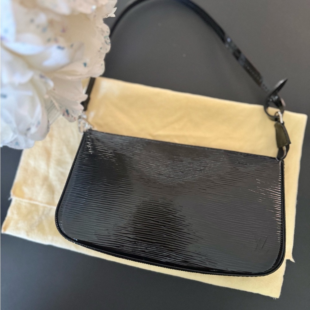 Black Epi Electric Leather Pochette Accessoires New Model. Silver Hardware